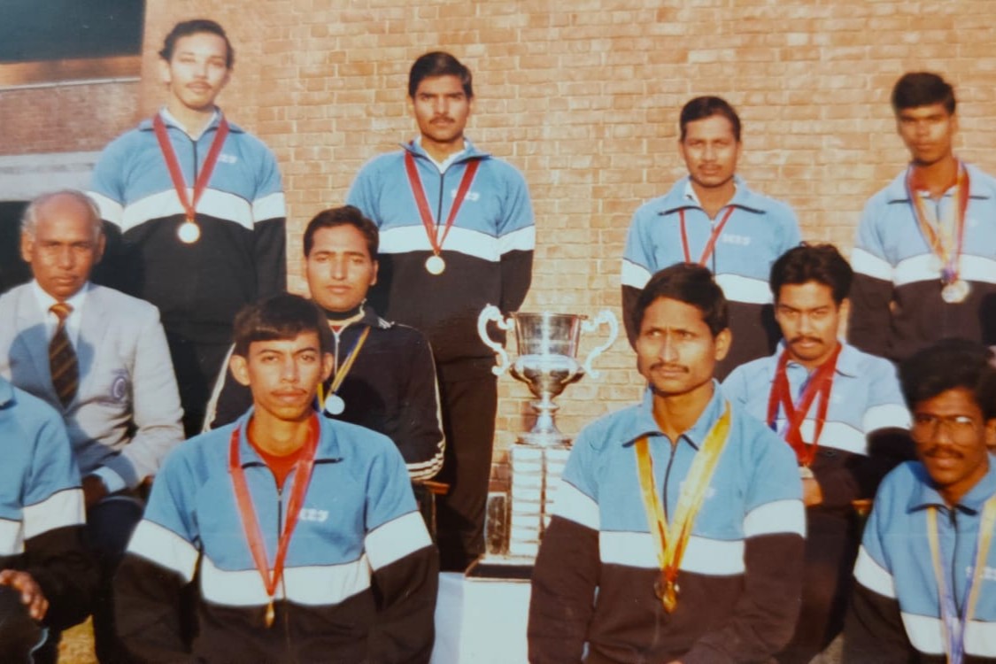 Ajay lifting the championship trophy