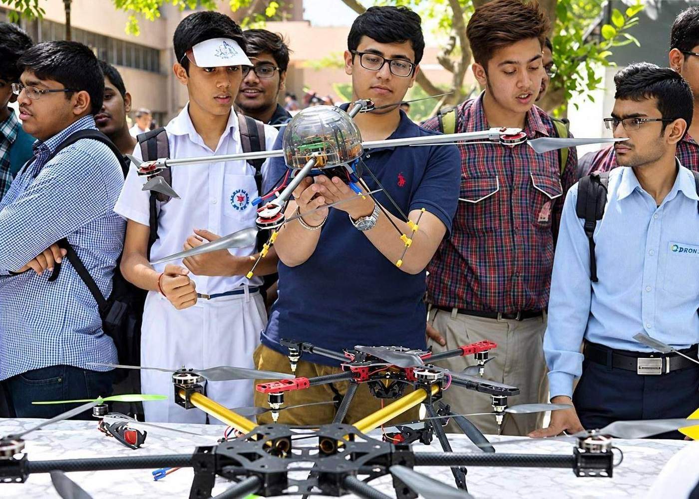 Student working on a drone project in a lab