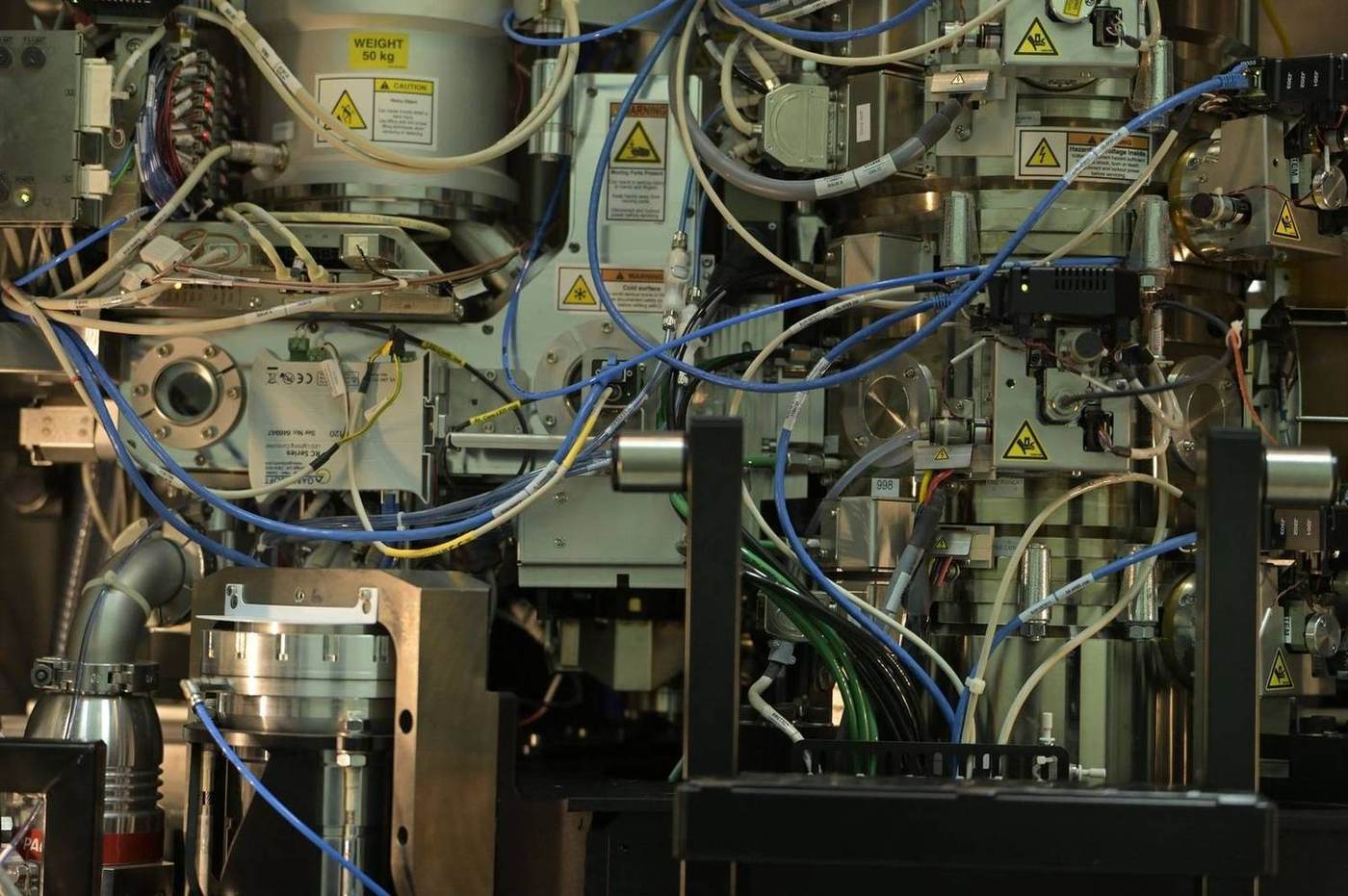 Precision machinery with sensor cabling in a research facility
