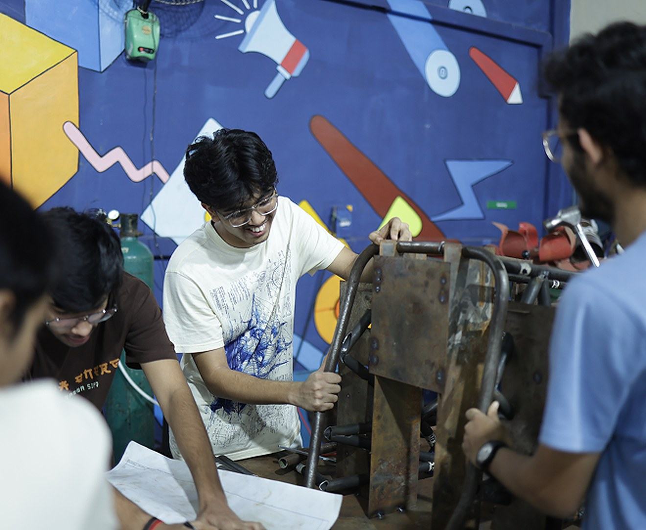 Students building a project in a workshop