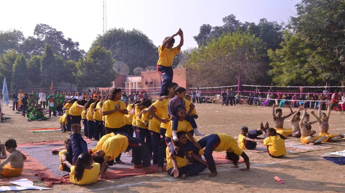Opportunity School students performing a human pyramid at the annual sports day