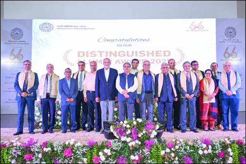 A group of men standing in front of a large screen

AI-generated content may be incorrect.