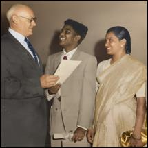 A person and person standing together

AI-generated content may be incorrect.