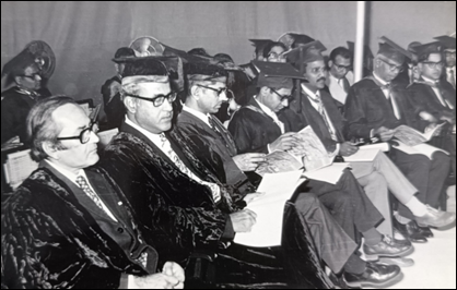 A group of people sitting in a row

AI-generated content may be incorrect.