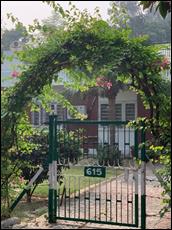 A gate with a green arch

AI-generated content may be incorrect.