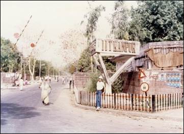 A person standing in front of a sign

AI-generated content may be incorrect.