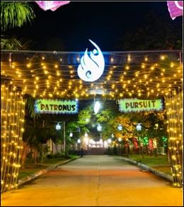 A walkway with lights and signs

AI-generated content may be incorrect.