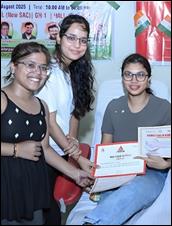 A group of women smiling and holding papers

AI-generated content may be incorrect.