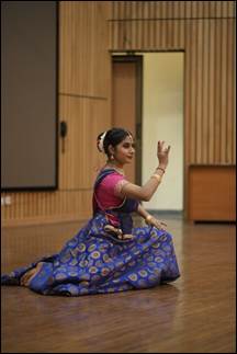 A person in a blue and purple dress

AI-generated content may be incorrect.